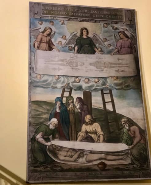 Plakat przedstawiający zdjęcie z krzyża Chrystusa i owinięcie Go w prześcieradło, Całun Turyński