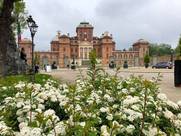 Castello di Racconigi w Piemoncie jako jeden z zamków Residenze Sabaude wpisany na listę dziedzictwa kultury UNESCO